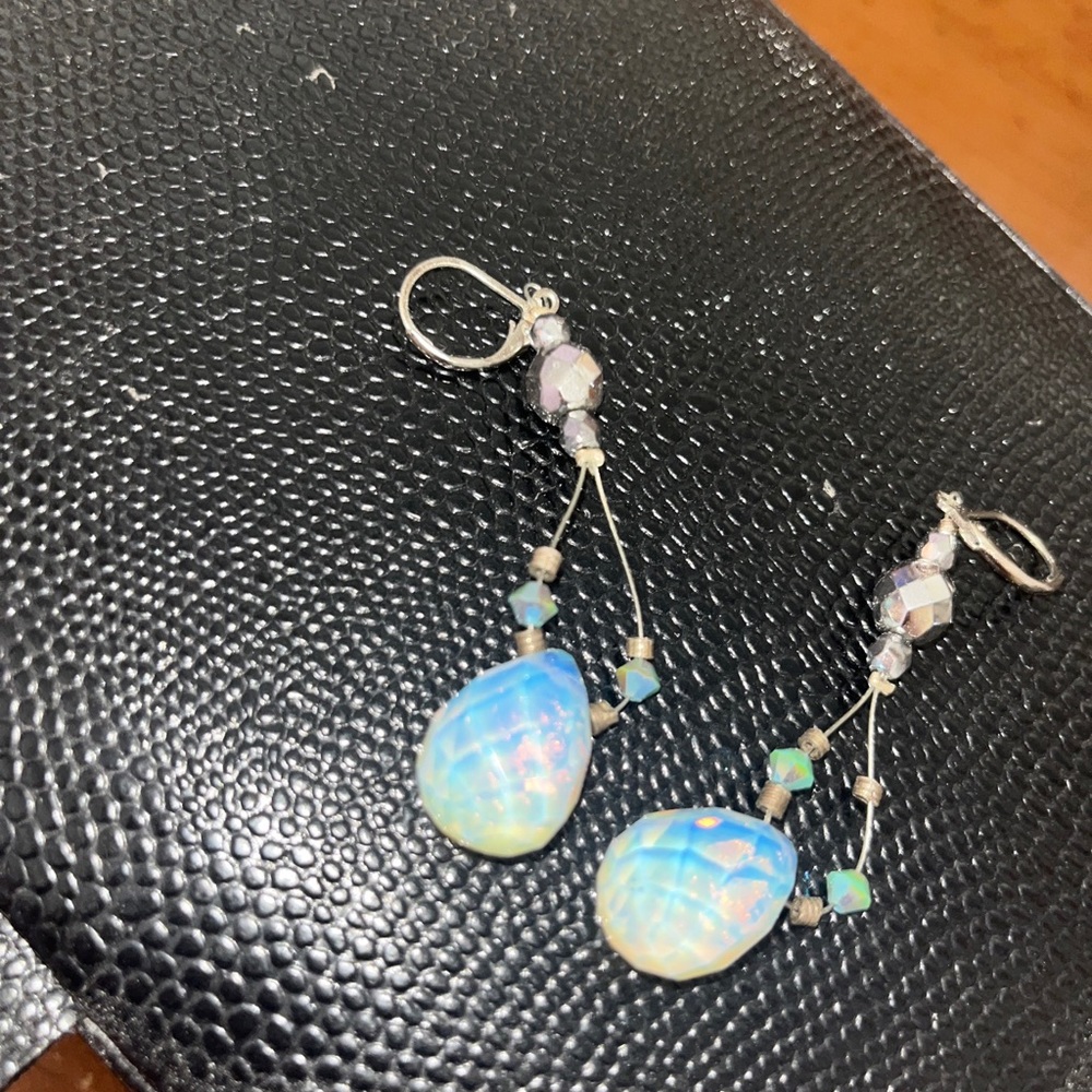 Pierced silver plated earrings.
